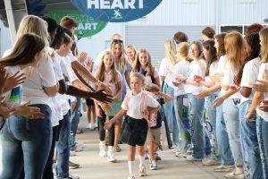 Seniors welcome students across all buildings on the first day of school.