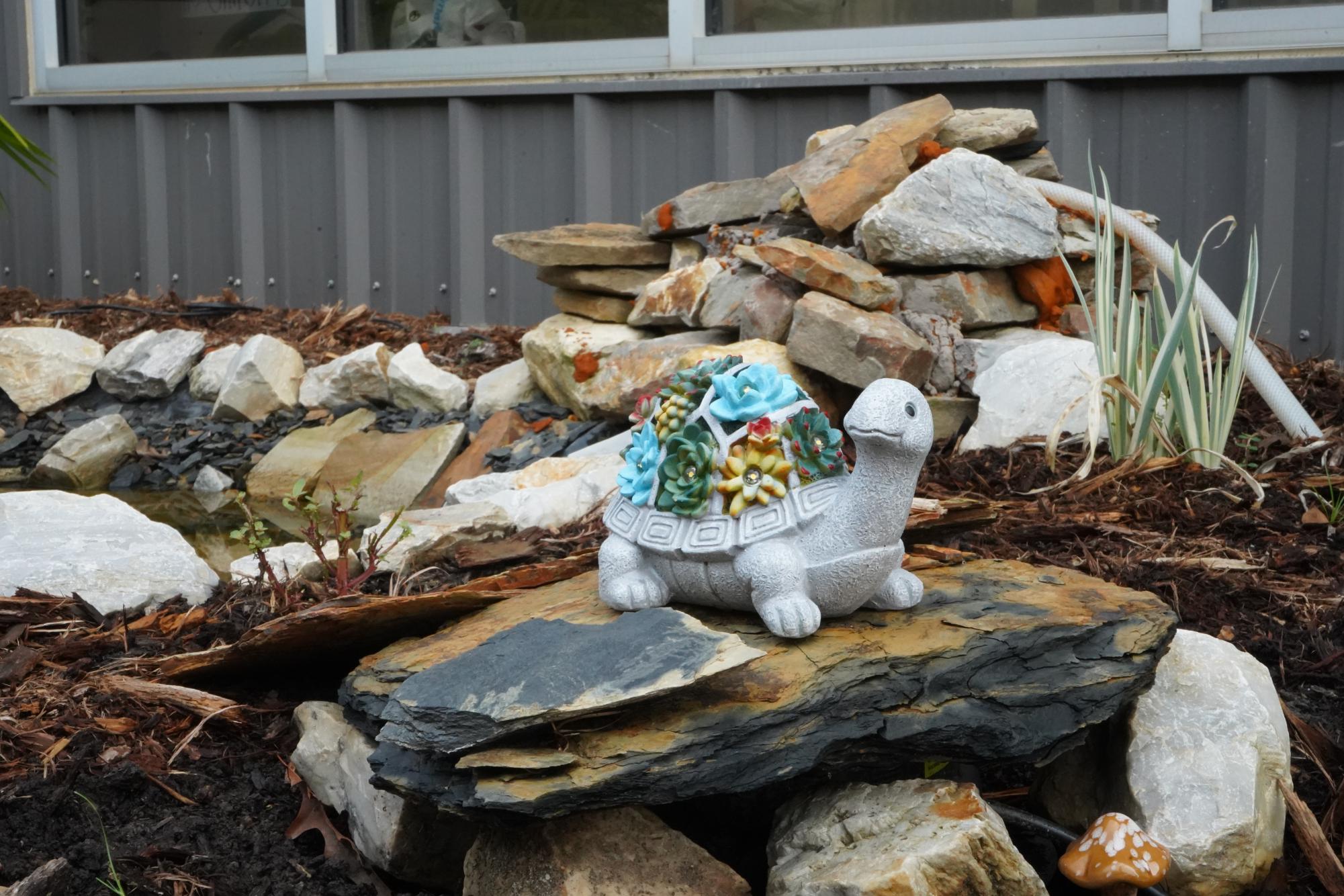 Pottery garden has small statues hiding everywhere 